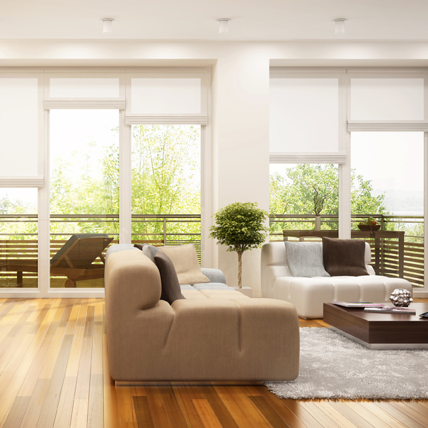 Warm honey coloured floorboards and neutral wall colours provide character